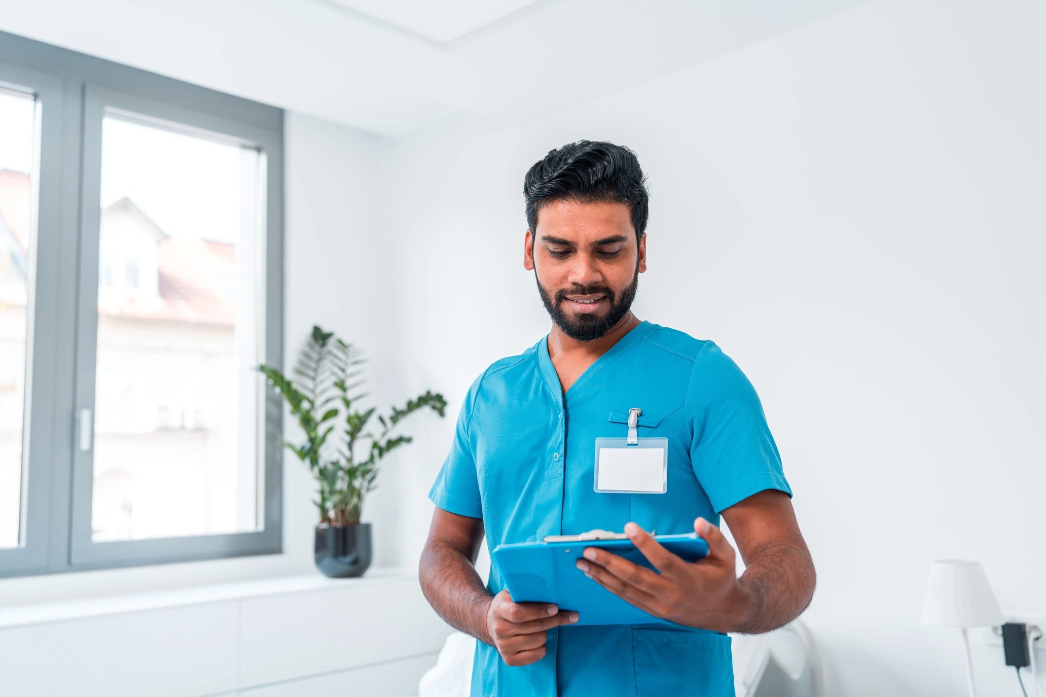 Healthcare professional with a medical chart in a hospital